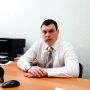 николай