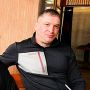 николай